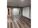 Large living room with wood floors, large windows and a ceiling fan at 4341 Aqua Vista Dr # A, Orlando, FL 32839
