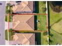 Overhead aerial view of home with large backyard surrounded by lush greenery and nearby houses at 2736 Atherton Dr, Orlando, FL 32824