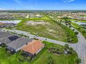 Stunning aerial view showcases a large lot and a beautiful neighborhood at 605 San Augusto Dr, Kissimmee, FL 34759