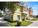 Beautiful townhome featuring maintained landscaping and a view to the water at 4014 Santa Maria Dr # 101, Kissimmee, FL 34741