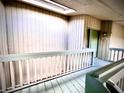 Hallway with a view, showing the entrance door of unit 806 at 806 Pinewood Ct # 3135/6, Haines City, FL 33844