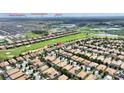 Aerial view showcasing the community's location with proximity to nearby attractions at 1353 Palmetto Dunes St, Davenport, FL 33836