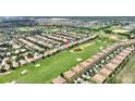 Elevated view featuring a golf course with lush greenery and stunning views at 1353 Palmetto Dunes St, Davenport, FL 33836
