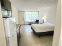 Cozy living space with a view of the outdoors at 7900 S Orange Blossom Trl # 2102, Orlando, FL 32809