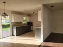 Bright kitchen with stylish cabinets, backsplash, and modern appliances at 1203 Atlantic Ct, Kissimmee, FL 34759