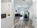 Bright living area with wood flooring, modern furniture and a relaxed atmosphere at 1659 Sage Creek Ct, Orlando, FL 32824