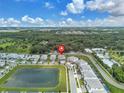 Beautiful home in a desirable neighborhood near a pond with well-maintained landscaping at 2417 Shanti Dr, Kissimmee, FL 34746