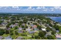 Aerial view of homes and trees in the Lake Marian community at 415 Smiley Ct, Winter Haven, FL 33884