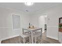 Cozy dining area with seating for four and contemporary decor at 1501 Missouri Ave, St Cloud, FL 34769