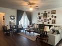 Cozy living room with stylish furnishings and a large window at 1868 Katz Crossing Dr, Kissimmee, FL 34744