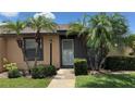 Attractive single-story residence with lush landscaping and a welcoming entrance at 2326 St Marteen Ct, Kissimmee, FL 34741