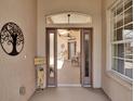 Welcoming entryway with screened lanai view at 4244 Windchime Ln, Lakeland, FL 33811