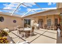 Covered lanai with ample seating, perfect for entertaining at 4244 Windchime Ln, Lakeland, FL 33811