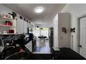 Bright kitchen with granite countertops, stainless appliances, and tiled backsplash at 10207 Cody Ln, Orlando, FL 32825