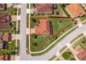 Overhead view of home with large lot in neighborhood at 1776 Bella Lago Dr, Clermont, FL 34711