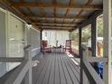 Covered front porch with rocking chairs and decor at 3050 Old Soldier Rd, Lakeland, FL 33810