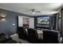 Enjoyable media room with large screen and comfortable seating at 9126 Sommerset Hills Dr, Davenport, FL 33896