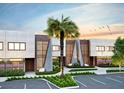 Striking townhome exterior with palm tree and modern landscaping enhances curb appeal, set against a serene sky at 5573 Torino Rd, Kissimmee, FL 34746