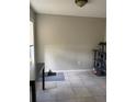 Bright dining area with tile flooring and ample space for dining with a window at 5861 La Costa Dr # 115, Orlando, FL 32807