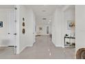 Bright and spacious hallway with modern decor throughout the home at 3026 Prospect Trl, St Cloud, FL 34771
