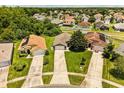 Aerial view of a neighborhood showcasing the home's location and surrounding landscape at 3217 Whooping Crane Run, Kissimmee, FL 34741