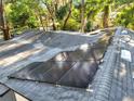 Roof with solar panels installed at 7043 Carlene Dr, Orlando, FL 32835
