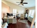Bright office space with vaulted ceiling, ceiling fan, plantation shutters and plenty of natural light at 3407 Santa Monica Dr, Orlando, FL 32822