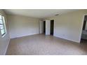 Spacious bedroom featuring tile floors and a walk-in closet at 15 Clear Way, Ocala, FL 34472