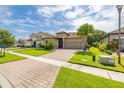 A home in an attractive neighborhood with manicured lawns and tree lined streets at 3837 Carrick Bend Dr, Kissimmee, FL 34746
