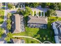 A community with multiple screened-in pools and lush landscaping at 8112 Princess Palm Ln, Kissimmee, FL 34747