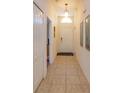 Light and airy entryway with tile flooring and ample space at 2005 Royal Ridge Dr, Davenport, FL 33896