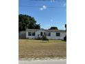 Single-wide manufactured home with a spacious yard at 4316 Upper Meadow Rd, Mulberry, FL 33860