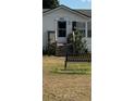 Mobile home entrance with steps and landscaping at 4316 Upper Meadow Rd, Mulberry, FL 33860