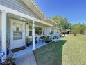 Charming entrance featuring a well-manicured lawn and inviting curb appeal at 1803 Fredricksburg Ave, Lakeland, FL 33803