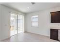 Bright breakfast nook with sliding glass doors leading to the backyard at 4416 Sw 84Th Street Rd, Ocala, FL 34476