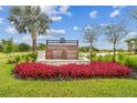 Hawthorne Ranch entrance sign featuring a water feature and vibrant landscaping at 4897 Foxglove Dr, Lakeland, FL 33811