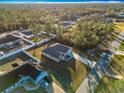 Aerial view of a house and neighborhood at 16962 Sw 40Th Cir, Ocala, FL 34473