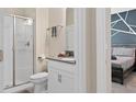Clean bathroom with walk-in shower, toilet, and vanity at 8989 Cabot Cliffs Dr, Davenport, FL 33896