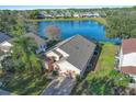 House with lake view and screened-in pool at 16741 Rising Star Dr, Clermont, FL 34714