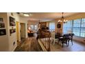 Bright hallway offering a view of the dining and living areas at 469 Blue Heron Cir # 469, River Ranch, FL 33867