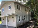 Two-story house with covered porch at 810 Avenue L Sw, Winter Haven, FL 33880