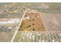 Aerial view showing home and surrounding property at 6085 Lightsey Rd, Fort Meade, FL 33841