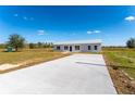 Newly built home with concrete driveway at 6085 Lightsey Rd, Fort Meade, FL 33841