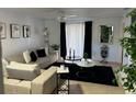Comfortable living room featuring sectional sofa and coffee table at 401 Century Blvd # C, Auburndale, FL 33823