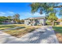 House with a large backyard and paved driveway at 2259 Minnesota Ave, Winter Park, FL 32789