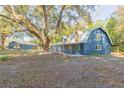 Log cabin home with detached garage and expansive yard at 4269 Wc 48, Bushnell, FL 33513