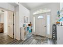 Bright and airy entryway with wood-look flooring at 14544 Sw 112Th Cir, Dunnellon, FL 34432