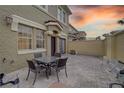 Private patio with brick pavers and small table at 2888 Bella Vista Dr, Davenport, FL 33897