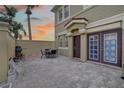 Private patio with brick pavers and seating area at 2888 Bella Vista Dr, Davenport, FL 33897