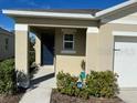 Exterior of house showcasing front entrance and landscaping at 30364 Armenia Rd, Leesburg, FL 34748